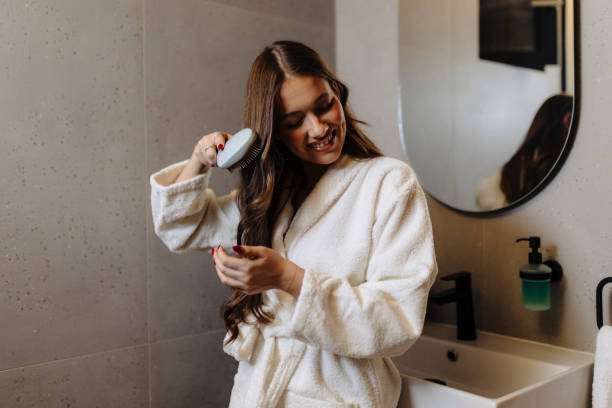 Hair oil, hair treatment and hair care on woman with natural
